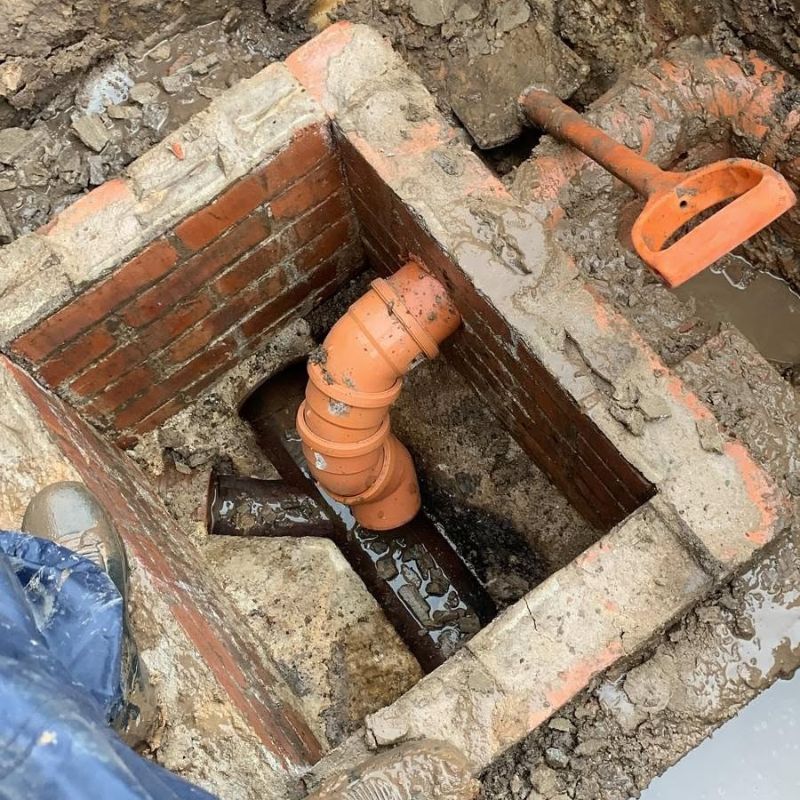 Drainage inspection chamber and underground pipework during installation