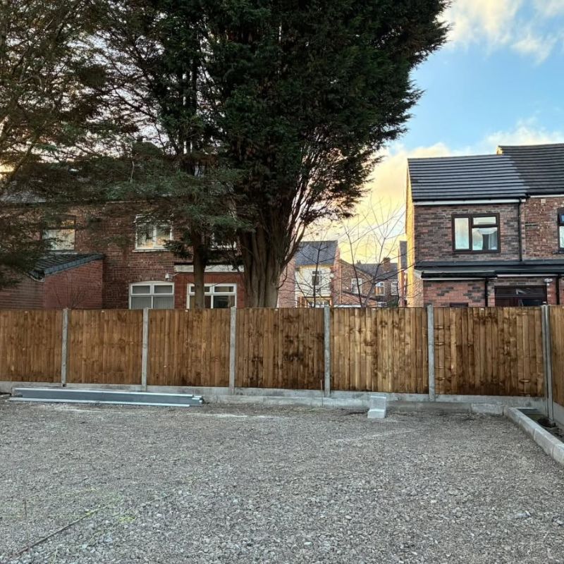 Gravelled exterior hardstanding with new timber fencing